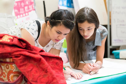 Teens working on a project together.