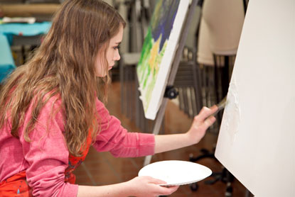 Teen working on a canvas
