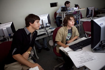 Teens working together in the computer lab