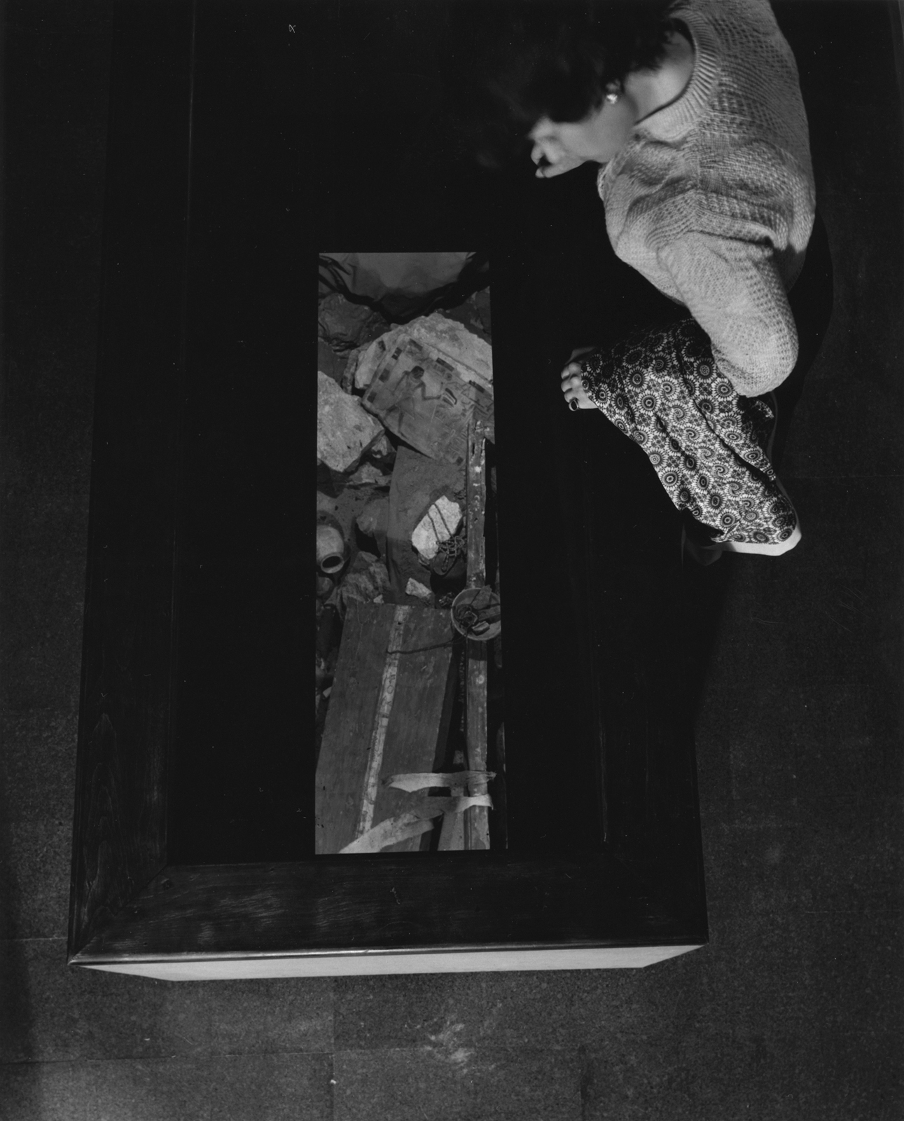 Miss Pinckney looking down on the mummy tombEgyptian Gallery 5-1-1961