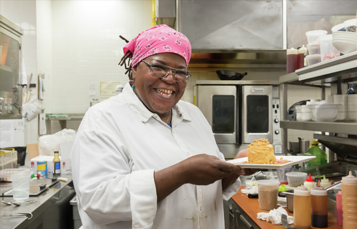 Juana Straus with one of her confectionery creations.