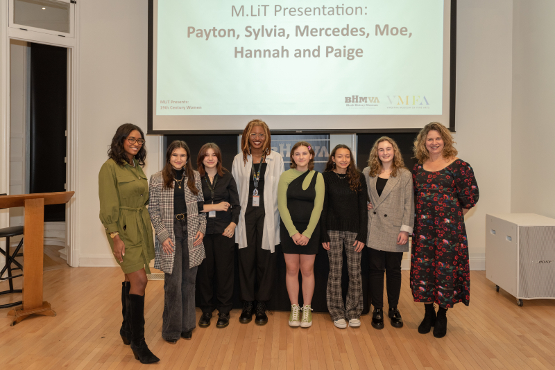 Liza Mickens (far left) and Kristen Green (far right) were invited by M.LiT students to present on the topic of 19th-century women.