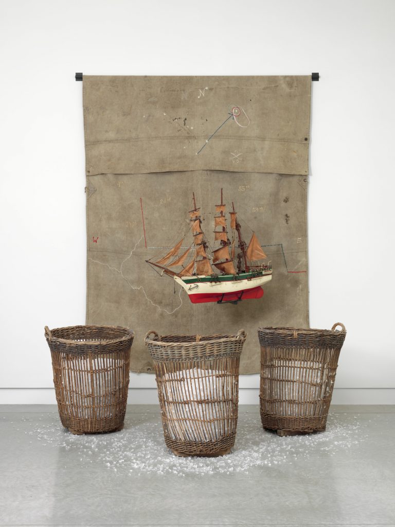 Vessel, 2012, Radcliffe Bailey (American, born 1968), tarp, thread, idron, vintage model ship, African sculpture, wicker basket, glass. Pamela K. and William A. Royall Jr. Fund for 21st Century Art and National Endowment for the Arts Fund for American Art. 2014.5 © Radcliffe Bailey