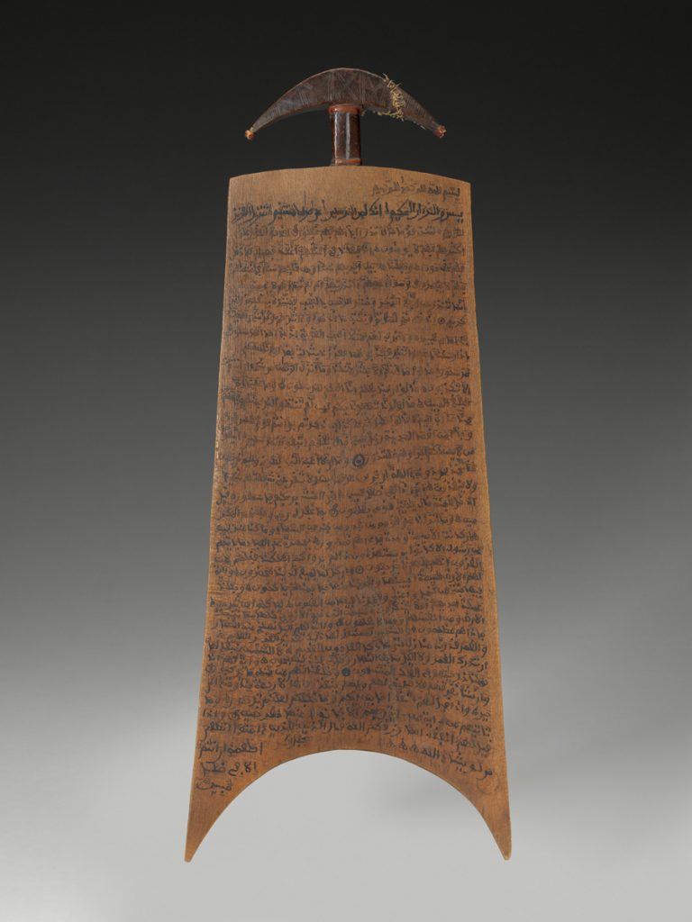 Qur’anic Writing Tablet, 19th-20th century, Hausa culture (Nigeria), wood, leather, string, pigment. Arthur and Margaret Glasgow Fund, 95.83