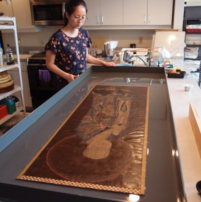 VMFA's early 14th-century scroll, Standing Arhat, was cleaned and conserved by Nishio Conservation Studio. Photo by Nishio Conservation Studio