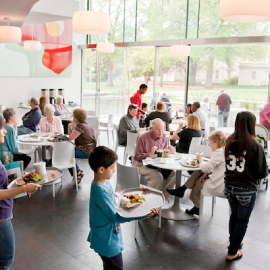 Museum visitors enjoying the dining options at Best Café