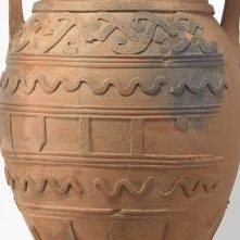 <p>Make your way out of the American Galleries, toward the Ancient Galleries courtyard. This large Greek storage jar is covered in geometric and organic shapes! What do you think might have been stored in here?</p>
