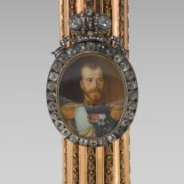<p>Fabergé and Russian Decorative Arts Galleries, Level 2</p>
<p>Look for the Imperial Column Portrait Frame that holds a portrait of Tsar Nicholas II. Many rulers have widely distributed their own images to heighten their prestige. What are some other dazzling objects with images of important people?</p>
