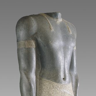 <p>Ancient Egyptian Gallery: </p>
<p>This is Senkamanisken, who was the King of the ancient African empire of Kush. Look closer at his proportions—how would you describe his size? Why do you think he was depicted in this way? </p>
