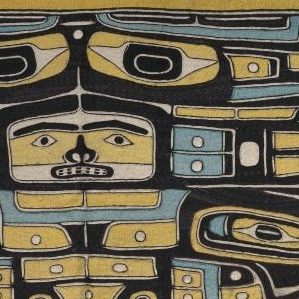 <p>Just across Evans Court from the Ndebele murals, locate this Chilkat blanket, which is made of cedar bark, wool, and other materials, in the Native North American Art gallery. Can you find a face in this blanket? </p>
